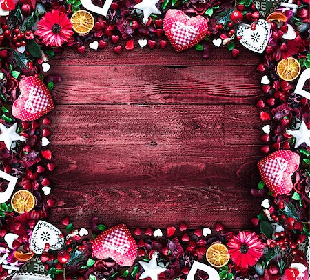 simsearch:400-08034169,k - Valentine's Day Background with love themed elements like cotton and paper hearts, flowers, berries, oranges and other decorations. Wooden old parquet on the back. Stock Photo - Budget Royalty-Free & Subscription, Code: 400-08958149