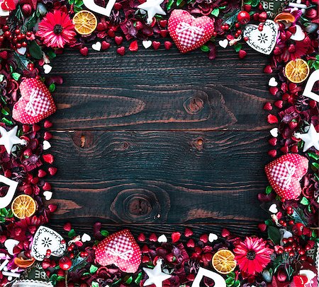 simsearch:400-08034169,k - Valentine's Day Background with love themed elements like cotton and paper hearts, flowers, berries, oranges and other decorations. Wooden old parquet on the back. Stock Photo - Budget Royalty-Free & Subscription, Code: 400-08958154