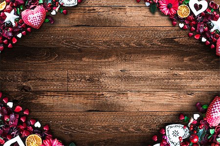 simsearch:400-08034169,k - Valentine's Day Background with love themed elements like cotton and paper hearts, flowers, berries, oranges and other decorations. Wooden old parquet on the back. Stock Photo - Budget Royalty-Free & Subscription, Code: 400-08958157