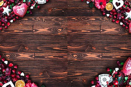 simsearch:400-08034169,k - Valentine's Day Background with love themed elements like cotton and paper hearts, flowers, berries, oranges and other decorations. Wooden old parquet on the back. Stock Photo - Budget Royalty-Free & Subscription, Code: 400-08958159