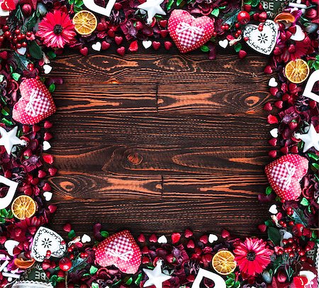 simsearch:400-08034169,k - Valentine's Day Background with love themed elements like cotton and paper hearts, flowers, berries, oranges and other decorations. Wooden old parquet on the back. Stock Photo - Budget Royalty-Free & Subscription, Code: 400-08958151