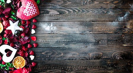 simsearch:400-08034169,k - Valentine's Day Background with love themed elements like cotton and paper hearts, flowers, berries, oranges and other decorations. Wooden old parquet on the back. Stock Photo - Budget Royalty-Free & Subscription, Code: 400-08958177