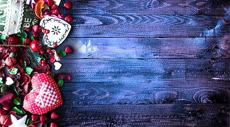 simsearch:400-08034169,k - Valentine's Day Background with love themed elements like cotton and paper hearts, flowers, berries, oranges and other decorations. Wooden old parquet on the back. Stock Photo - Budget Royalty-Free & Subscription, Code: 400-08958179