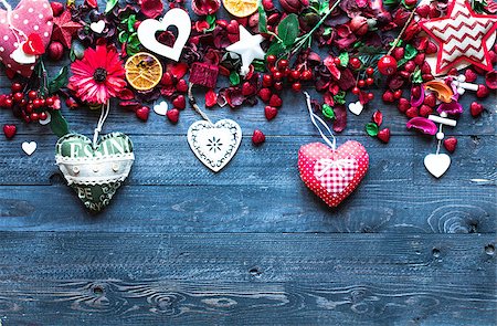 simsearch:400-08034169,k - Valentine's Day Background with love themed elements like cotton and paper hearts, flowers, berries, oranges and other decorations. Wooden old parquet on the back. Stock Photo - Budget Royalty-Free & Subscription, Code: 400-08958181