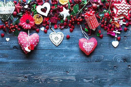 simsearch:400-08034169,k - Valentine's Day Background with love themed elements like cotton and paper hearts, flowers, berries, oranges and other decorations. Wooden old parquet on the back. Stock Photo - Budget Royalty-Free & Subscription, Code: 400-08958182