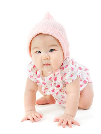 simsearch:400-07171482,k - Portrait of full length adorable Asian baby girl in pink clothes crawling on floor, isolated on white background. Stock Photo - Budget Royalty-Free & Subscription, Code: 400-08996831
