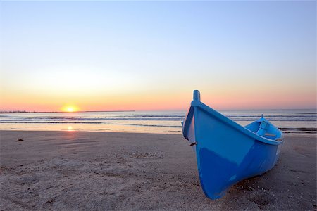 paradise sunset beach - Fishing boat and sunrise at black sea Stock Photo - Budget Royalty-Free & Subscription, Code: 400-08997219