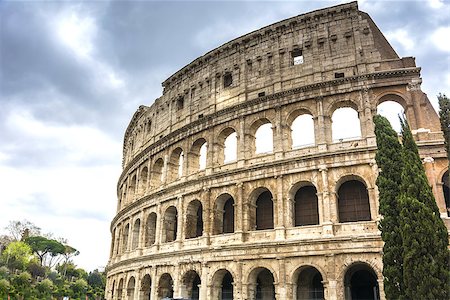 simsearch:400-05314184,k - view on the Great Roman Colosseum Coliseum, Colosseo ,also known as the Flavian Amphitheatre. Famous world landmark. Scenic urban landscape. Rome. Italy. Europe Stock Photo - Budget Royalty-Free & Subscription, Code: 400-09009510