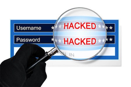 The concept of computer security. Hand with magnifying glass checks a username and password on hacking Stock Photo - Budget Royalty-Free & Subscription, Code: 400-09010608