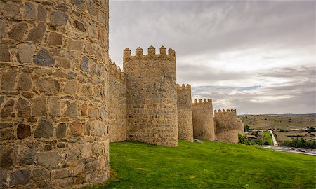 simsearch:400-05193127,k - Walls of the historic city of Avila,at the blue hour, in Spain. the old city of Avila and its extramural churches were declared a World Heritage site by UNESCO Stock Photo - Budget Royalty-Free & Subscription, Code: 400-09010800