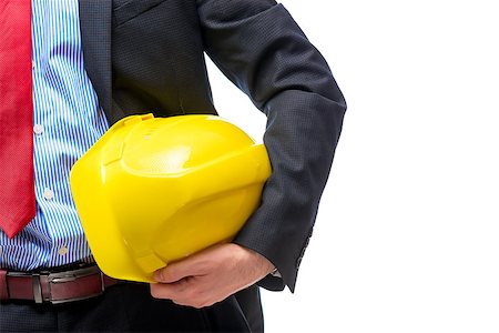 Boss architect in suit with helmet in hand, close-up hand Stock Photo - Budget Royalty-Free & Subscription, Code: 400-09011113