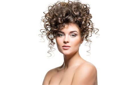 simsearch:400-04021280,k - beautiful young woman with big curly hairdo. beauty shot isolated on white background.  copy space. Stock Photo - Budget Royalty-Free & Subscription, Code: 400-09031618