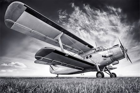 simsearch:400-08188604,k - historic biplane against a cloudy sky Stock Photo - Budget Royalty-Free & Subscription, Code: 400-09032382