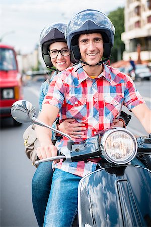 Young scooter driver in the streets of Berlin Mitte Stock Photo - Budget Royalty-Free & Subscription, Code: 400-09064657