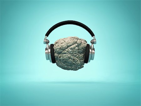 Listening rock music concept - headphones placed on a rock. 3d render illustration Stock Photo - Budget Royalty-Free & Subscription, Code: 400-09067961
