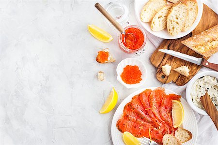 simsearch:400-05311244,k - Delicious lunch with salted salmon, red caviar, fresh bread and cream cheese, top view Foto de stock - Super Valor sin royalties y Suscripción, Código: 400-09084586