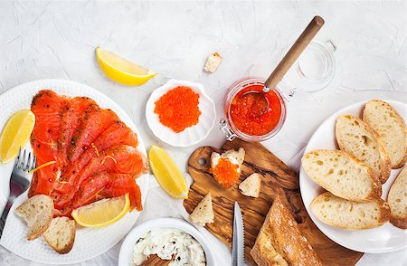 simsearch:400-05311244,k - Delicious lunch with salted salmon, red caviar, fresh bread and cream cheese, top view Foto de stock - Super Valor sin royalties y Suscripción, Código: 400-09084587