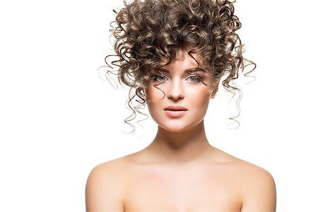 simsearch:400-04021280,k - beautiful young woman with big curly hairdo. beauty shot isolated on white background.  copy space. Stock Photo - Budget Royalty-Free & Subscription, Code: 400-09081321
