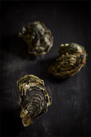 Raw oysters on the graphite board, France Stock Photo - Budget Royalty-Free & Subscription, Code: 400-09091986