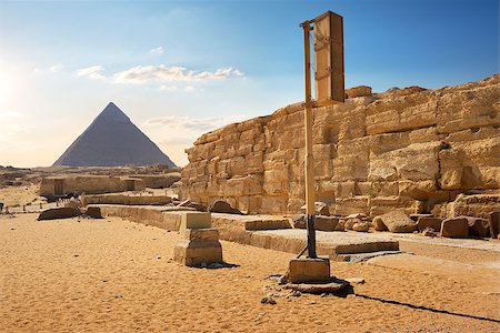 simsearch:400-04652920,k - Egyptian pyramids in sand desert and clear sky Photographie de stock - Aubaine LD & Abonnement, Code: 400-09113639