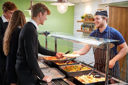 Teenage Students Being Served Meal In School Canteen Photographie de stock - Aubaine LD & Abonnement, Code: 400-09122077