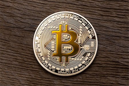 Golden yellow bitcoin on wooden background. High resolution photo. Stock Photo - Budget Royalty-Free & Subscription, Code: 400-09132539