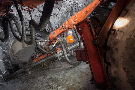 A tunnel with gold mining machine underground. Stock Photo - Budget Royalty-Free & Subscription, Code: 400-09140615