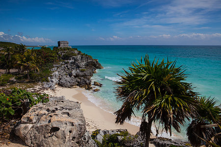 Majestic ruins in Tulum.Tulum is a resort town on Mexicos Caribbean coast. The 13th-century, walled Mayan archaeological site at Tulum National Park overlooks the sea. Stock Photo - Budget Royalty-Free & Subscription, Code: 400-09193375