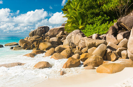 simsearch:400-05745636,k - Beautifully shaped granite boulders and a perfect white sand at the famous Anse Georgette, Praslin island, Seychelles Stock Photo - Budget Royalty-Free & Subscription, Code: 400-09224256