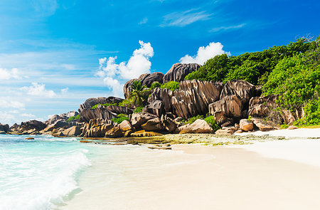simsearch:400-05745636,k - Beautifully shaped granite boulders and a perfect white sand at Grand Anse, La Digue island, Seychelles Stock Photo - Budget Royalty-Free & Subscription, Code: 400-09224259