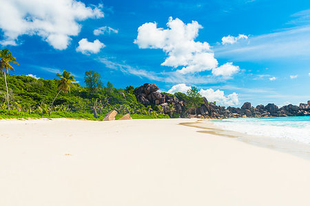 simsearch:400-05745636,k - Beautifully shaped granite boulders and a perfect white sand at Grand Anse, La Digue island, Seychelles Stock Photo - Budget Royalty-Free & Subscription, Code: 400-09224260