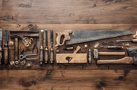 simsearch:600-00073204,k - Collection of vintage woodworking tools on a rough workbench and blank copy space: carpentry, craftsmanship and handwork concept, flat lay Stock Photo - Budget Royalty-Free & Subscription, Code: 400-09221557