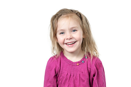 simsearch:400-07509444,k - Portrait of little beautiful smiling girl with disheveled hair isolated on white background Stock Photo - Budget Royalty-Free & Subscription, Code: 400-09237818