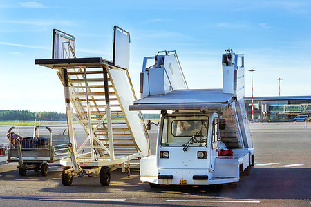 ramps on the road - Mobile gangway on airport runway, Marupe, Riga, Latvia. Road transport infrastructure of the international airport Stock Photo - Budget Royalty-Free & Subscription, Code: 400-09274605