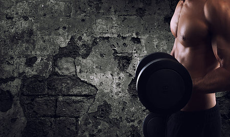 simsearch:400-05268701,k - Athletic muscular man training biceps at the gym Foto de stock - Super Valor sin royalties y Suscripción, Código: 400-09273580