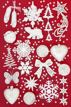 simsearch:400-07103223,k - White and silver Christmas frosted bauble decorations on red background. Traditional Christmas greeting card for the holiday season. Top view. Stock Photo - Budget Royalty-Free & Subscription, Code: 400-09273715
