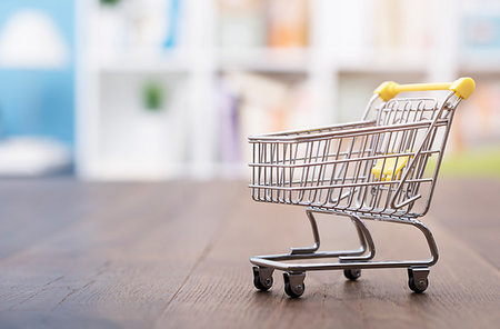 simsearch:400-04321973,k - Miniature empty shopping cart on a desktop, grocery shopping and retail concept Stock Photo - Budget Royalty-Free & Subscription, Code: 400-09273816