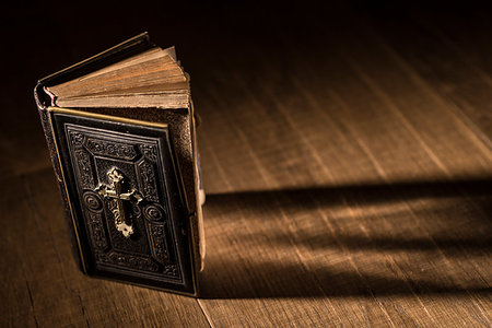 simsearch:400-05890930,k - Precious antique Bible on a wooden desktop, religion and spirituality concept Stock Photo - Budget Royalty-Free & Subscription, Code: 400-09273830