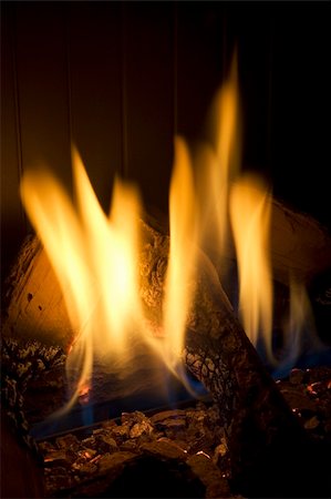 simsearch:614-03763965,k - Closeup of a cosy and warm fireplace. Long shutterspeed. Stock Photo - Budget Royalty-Free & Subscription, Code: 400-03908649