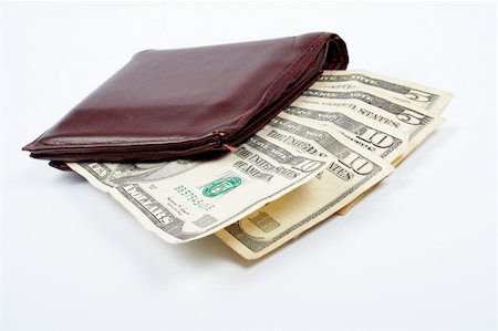 simsearch:693-06021323,k - Old leather wallet with bills inside, isolated on white background Stock Photo - Budget Royalty-Free & Subscription, Code: 400-03909006