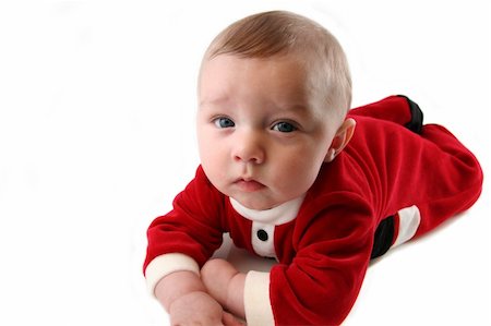 Baby Boy Laying Down in Santa Claus Outfit Stock Photo - Budget Royalty-Free & Subscription, Code: 400-03909012