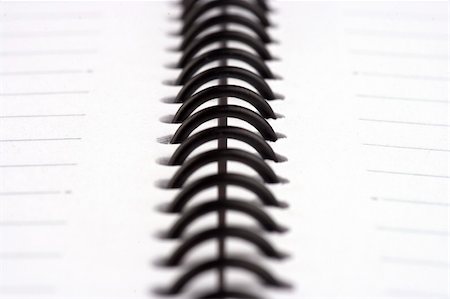 simsearch:6109-08395080,k - Close up of spiral note book, only focus on the center. Stock Photo - Budget Royalty-Free & Subscription, Code: 400-03909036