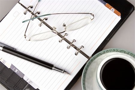 simsearch:6109-08395080,k - Close up of organizer with fountain pen and coffee. Stock Photo - Budget Royalty-Free & Subscription, Code: 400-03909030