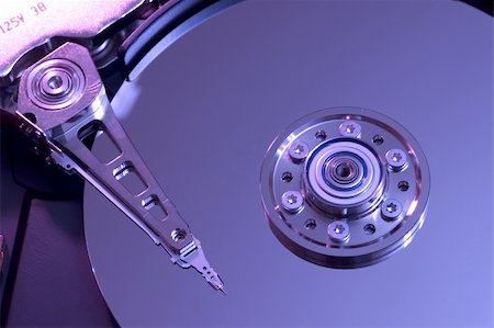 simsearch:400-05238336,k - Hard disk drive with its cover open Stock Photo - Budget Royalty-Free & Subscription, Code: 400-03909102