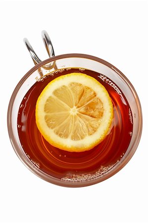 simsearch:700-03698239,k - A glass cup of tea with one slice of lemon. Shallow dof Stock Photo - Budget Royalty-Free & Subscription, Code: 400-03916161