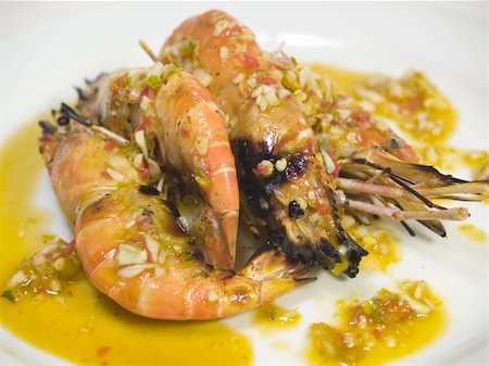 simsearch:825-05985428,k - Spicy grill prawns over hot charcoal with chilli and garlic sauce Stock Photo - Budget Royalty-Free & Subscription, Code: 400-03916548