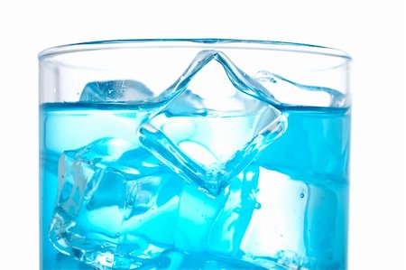 simsearch:400-03965729,k - Detail of blue cocktail with ice cubes on white background. Shallow DOF Stock Photo - Budget Royalty-Free & Subscription, Code: 400-03917774