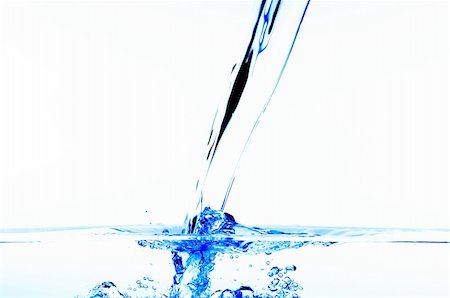 simsearch:622-07519538,k - Pouring water, water bubbles Stock Photo - Budget Royalty-Free & Subscription, Code: 400-03910388