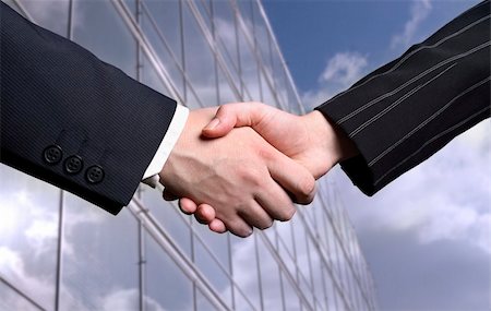 simsearch:400-04434336,k - business hand shake and a office in background, Stock Photo - Budget Royalty-Free & Subscription, Code: 400-03912835