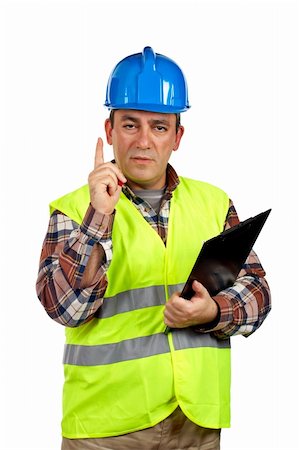 Construction worker with green safety vest and blank notebook. Finger up Stock Photo - Budget Royalty-Free & Subscription, Code: 400-03912899